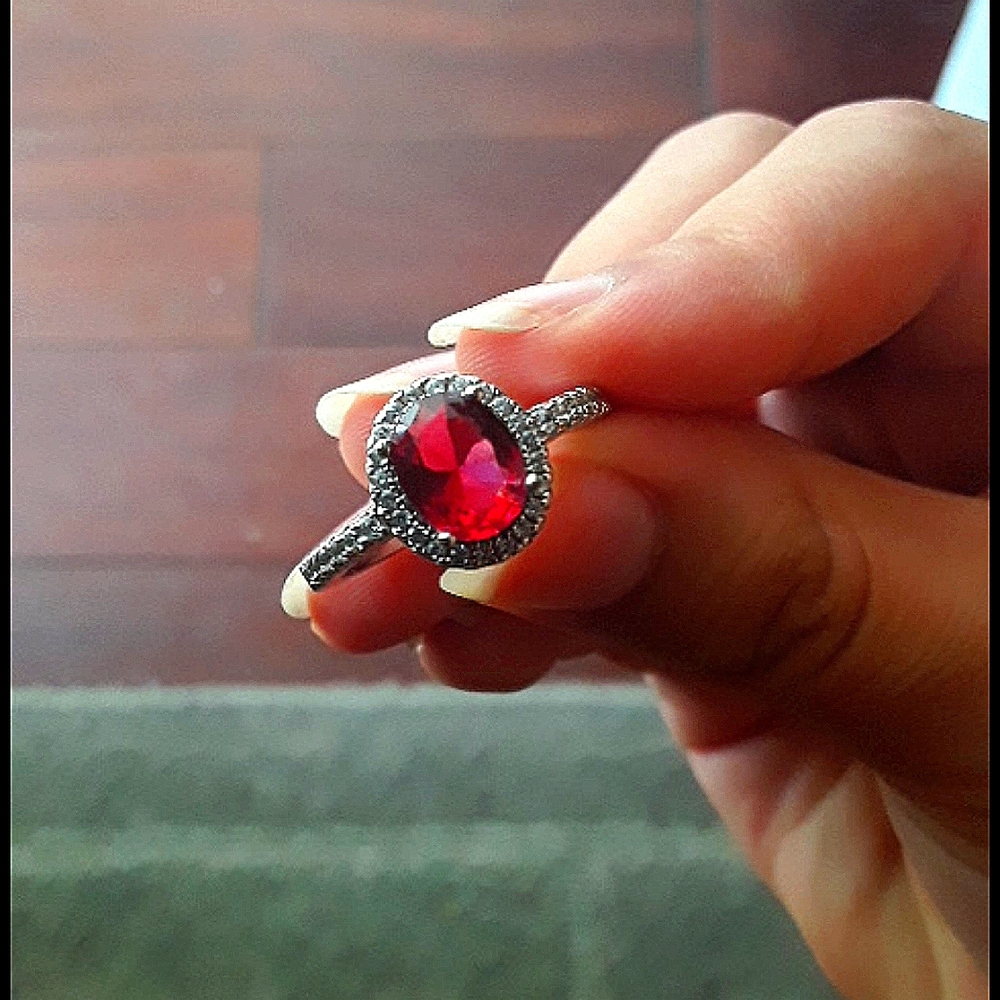 Ruby ring, silver band, diamond ring.